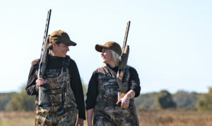 Karen Butler of Shoot Like a Girl (left) next to Daphane Cassidy, NSSF Content Manager, as they wrap up a good day of duck hunting.